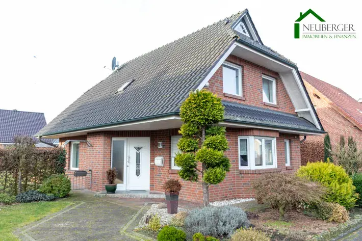 Gepflegtes Einfamilienhaus mit Garage und Garten in ruhiger Lage